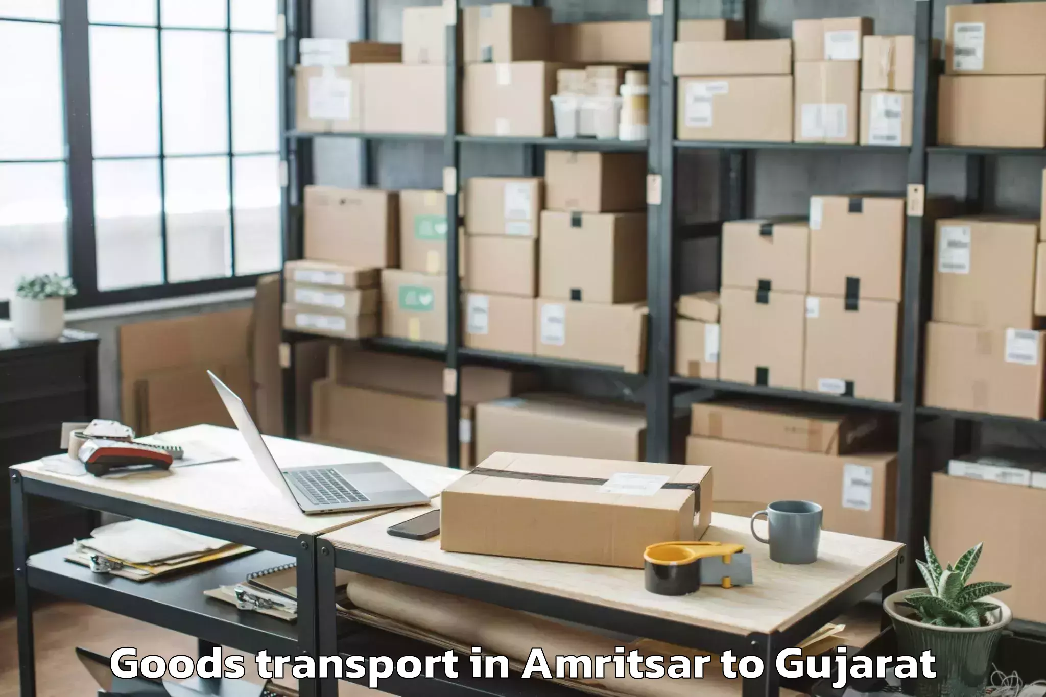 Top Amritsar to Karjan Goods Transport Available